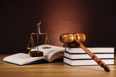 Two men charged with murder arraigned